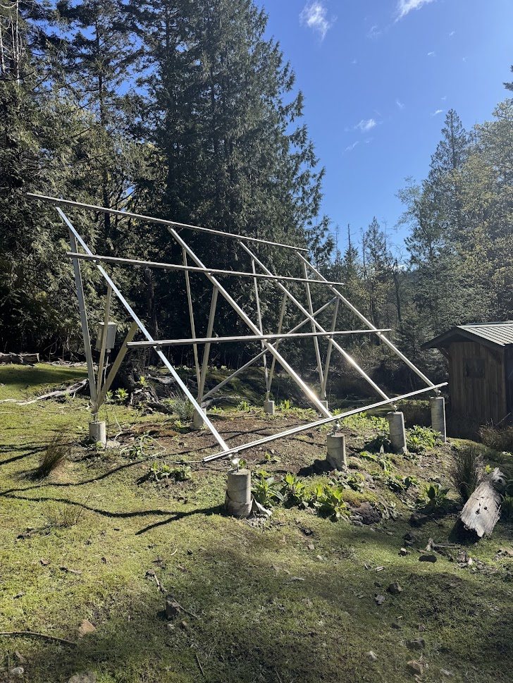 Ground mounted solar frame in a forested property