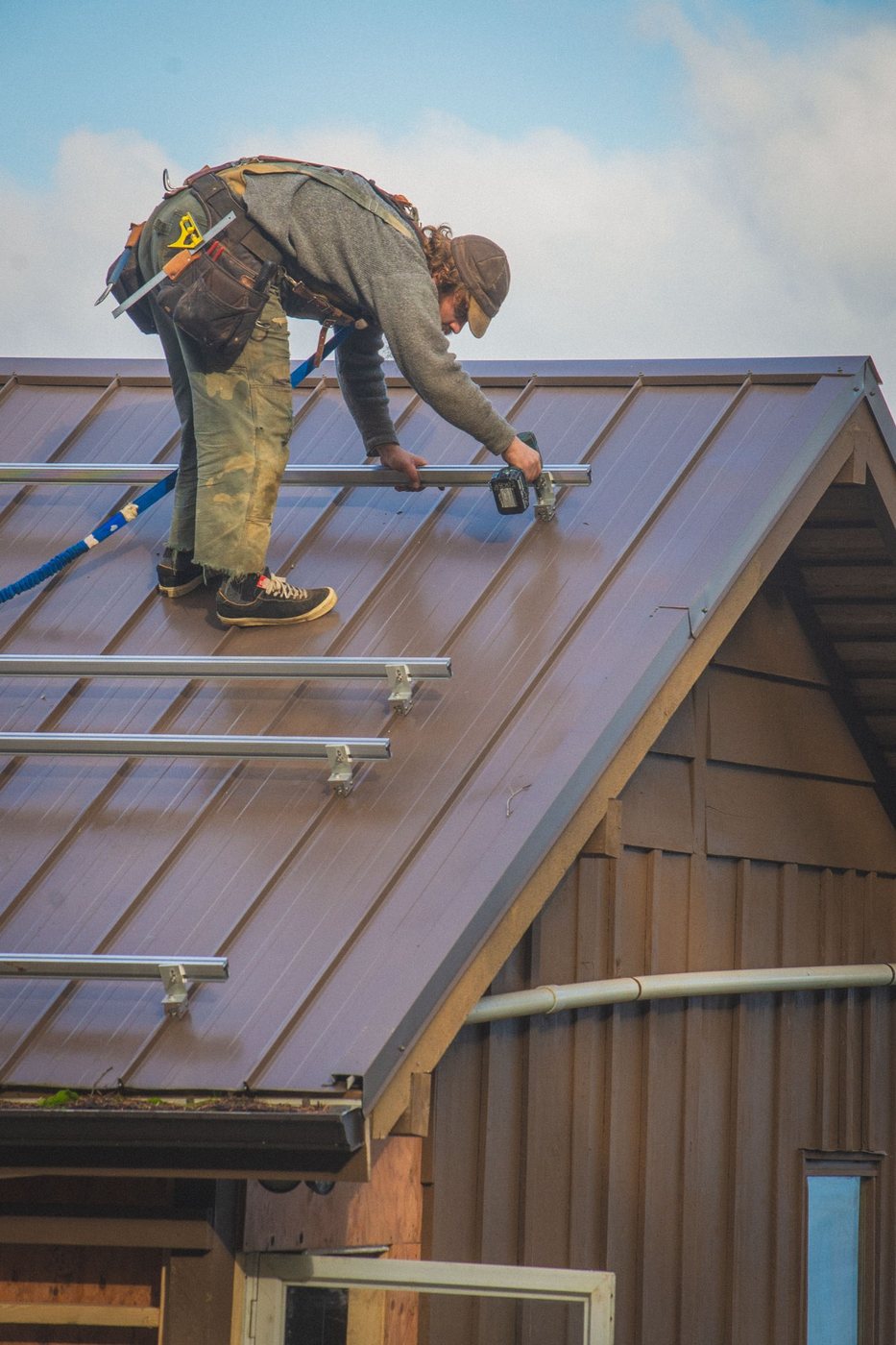 Installing solar racking on a metal roof